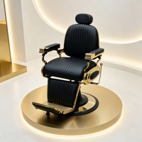 Chaise de coiffure sophistiquée noire et or, coussin en cuir côtelé, base ronde sur piédestal