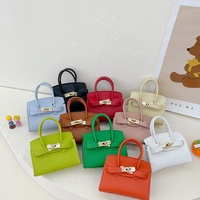 Sac à main mini tendance pour enfants en cuir PU, petit sac bandoulière avec sangle réglable, sac à bandoulière mignon pour femmes avec décoration étoile