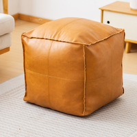 Coussin de sol carré en cuir moderne et écologique pour le rangement des vêtements
