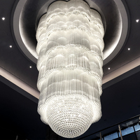 Lustre suspendu LED moderne de luxe personnalisé, grand lustre en cristal et acier inoxydable, base en fer, éclairage pour hall d'hôtel