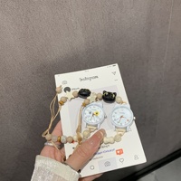 Petite montre-bracelet en alliage pour femme, écologique, artistique, à mouvement à quartz, style dessin animé mignon et de niche, idéale pour les meilleures amies et les étudiantes