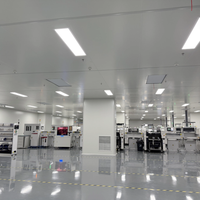 Ligne de fabrication de lots de circuits imprimés multi-variantes avec déchargeur SMT double magazine OK/NG, PLC et moteur, et conception à double compartiment à échange rapide
