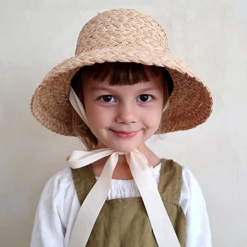 2023 bambini rafia lavorata a mano Retro Flat Top cappelli da sole ragazze e ragazzi estate viaggio protezione solare vacanza cappello da spiaggia di paglia