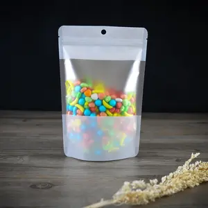 Papel de aluminio laminado impreso personalizado Snack Embalaje de plástico Ziplock Stand Up Pouch Embalaje de alimentos Bolsa de dulces con ventana transparente