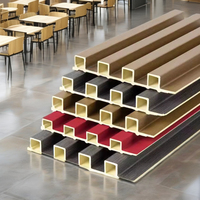 Panneau mural 3D imperméable Revêtement extérieur en fibre de ciment avec grain de bois Revêtement mural WPC pour applications hôtelières