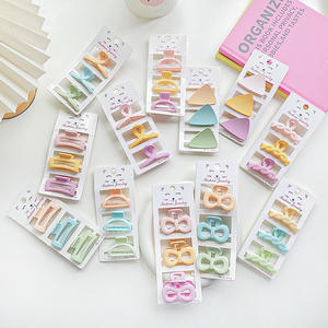 Novidade: Conjunto de 3 Mini Presilhas de Cabelo Femininas Estilo Doce em Plástico Fosco Cor Doce – Atacado - Product Image 1