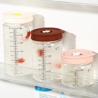 Bouteilles d'eau en verre de luxe, bocaux en verre personnalisés 75ml 250ml 500ml avec couvercle en silicone coloré et hermétique pour usage domestique OEM ODM