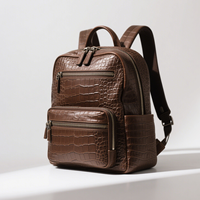 Fabricant OEM Sac à dos décontracté unisexe en peau de crocodile avec fermeture à cordon Sac de voyage en cuir d'alligator pour le travail