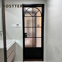 Porte battante élégante AOSTTER en aluminium à arche avec motif de grille classique et vitrage à haute transmission lumineuse pour une œuvre maîtresse