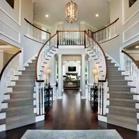 Escalier d'arc d'escalier incurvé de fantaisie de duplex avec la balustrade en fer forgé pour le prix usine de style australien de projet de villa