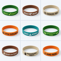 Bracelet en caoutchouc imprimé sur le thème des dinosaures pour enfants, logo personnalisé, qualité FDA, écologique, en gros, pour les garçons, cadeau d'anniversaire
