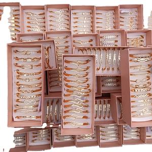 2024 en iyi fiyat afrika tarzı ucuz altın ve gümüş kaplama mix tasarımlar kadınlar için çinko alaşım rhinestone bilezik - Product Image 1