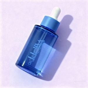 บรรจุภัณฑ์เครื่องสำอางแบบกำหนดเองขนาด 1 ออนซ์ ขวดเซรั่ม 30 มล. ทรงกระบอก ขวดแก้วแบบไหล่เรียบพร้อมหลอดหยดสำหรับน้ำมันหอมระเหย - Product Image 1