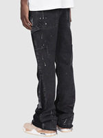 Salopette en jean pour homme, style européen et américain, tendance, avec patchs élastiques et bas évasé en denim laminé.