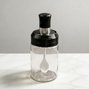 Cross-border kitchen seasoning jars, glass seasoning <b>bottles</b>, spoon and lid integrated seasoning jar set, household storage - Product Image 1
