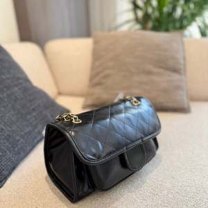 กระเป๋าถือหนังแท้คุณภาพสูงระดับไฮเอนด์สำหรับผู้หญิง ดีไซน์หรูหรา กันน้ำ เหมาะสำหรับฤดูใบไม้ผลิ ฤดูใบไม้ร่วง และชายหาด - Product Image 2