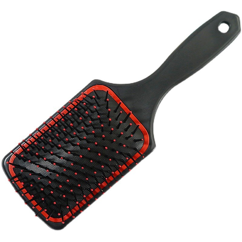 Large comb with red dots