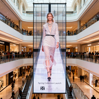 Écran LED transparent à grand angle de vision 160 ° Angle de vue Fenêtre Panneau d'affichage à LED en maille de verre pour centre commercial Atrium Public