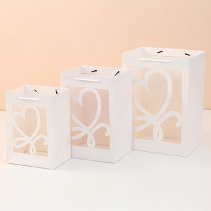 Sac cadeau créatif transparent pour la fête des enseignants Cartable en papier d'art avec fenêtre fleurie pour sac à main souvenir Bouquet Emballage <span class=keywords><strong>de</strong></span> poupée - Product Image 2