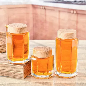 Grand pot en verre transparent de forme hexagonale personnalisé de haute qualité avec couvercle en bois pour les confitures de miel bouteille de stockage des aliments 50ml 180ml 280ml