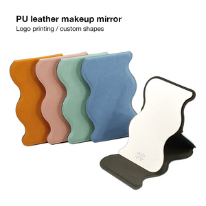 กระจกเงาแบบพกพา PU น้ำหนักเบา พร้อมพื้นผิวสัมผัสนุ่มและภาพสะท้อนคมชัดสำหรับการแต่งหน้าประจำวัน - Product Image 5