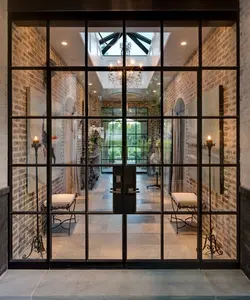 Precio barato Puertas francesas de metal Columpio Exterior Diseño de vidrio negro Puerta de patio de aleación de aluminio moderna