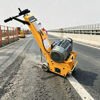 Scarificateur électrique pour béton de 250 mm, 7,5 kW, machine à fraiser manuelle pour le nivellement, la rénovation et l'entretien des sols
