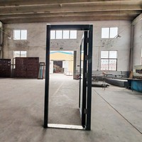 Porte en verre en acier inoxydable moderne, fabriquée en usine, à ouverture manuelle, pour la prévention des incendies et l'utilisation en atelier