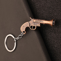 Porte-clés en métal modèle petit canon western et petit pistolet R45, pendentif jouet pistolet vintage exquis, décoration de sac à dos tendance, cadeau