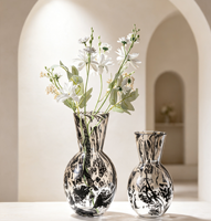 Vase en verre artistique K9 de luxe épaissi, motif tourbillon d'encre blanche et noire moderne, soufflé à la main, solide, pour décoration de table