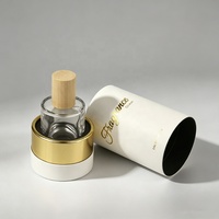 Emballage de parfum de luxe personnalisé avec logo en feuille d'or biodégradable, tube en papier cylindrique rond avec insert en mousse EVA