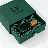 Boîte cadeau de luxe pour parfum avec logo personnalisé, tiroir coulissant, logo en relief doré, papier carton vert foncé, matériaux recyclés