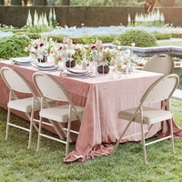 Portable Cuir Beige Rembourré Chaise Pliante En Gros Hôtel En Plein Air Événements De Mariage Cadre En Métal Chaises Pliables avec Poignée