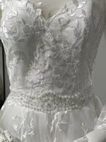 Nouvelle Robe de Mariée Longue à Traîne, Taille Mi-Haute, Dos Nu, Manches Longues, Effet Moelleux, Modèle Rêve, En Stock