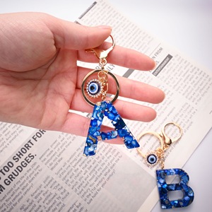 Nouveau Style bleu royal 26 alphabet anglais porte-clés oeil <span class=keywords><strong>du</strong></span> <span class=keywords><strong>diable</strong></span> lettre majuscule pendentif sac femme - Product Image 2