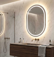 Cermin Kamar Mandi Pintar Modern Berbingkai Kaca Oval Cerdas yang Dipasang di Dinding dengan Layar Sentuh dan Lampu LED untuk Rias