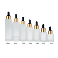 Botella de vidrio ámbar cilíndrica de hombro plano de gran venta, 20ml, 30ml, 60ml, con bomba dosificadora para loción/spray, impresión de superficie grabada con ácido