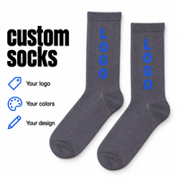 Chaussettes personnalisées bicolores grises, avec accent blanc incurvé et motif graphique bleu vertical, logo et couleurs personnalisés