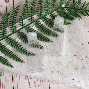30ml trapezoidal PET hand sanitizer <b>bottle</b> with inverted triangle shape, 18mm diameter <b>flip</b>-<b>top</b>, travel-sized dispenser. - Product Image 1