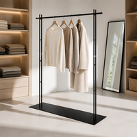 Porte-vêtements sur pied en métal noir mat, présentoir à vêtements à double tube, base pleine longueur, personnalisable en usine