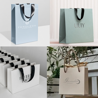 Sacs en papier personnalisés avec logo imprimé à prix réduit emballage de vêtements de luxe pour boutique sacs à cadeaux pour petites entreprises vente en gros