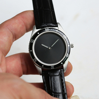 Montre à quartz analogique ultra-mince pour hommes, bracelet en cuir véritable de style vintage, boîtier en alliage de titane pour la mode, nouveauté