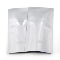 Sacs cosmétiques personnalisés en plastique Mylar et aluminium, hologramme argenté, étanches, scellés sur 3 côtés, pour masques faciaux