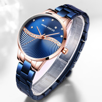 Montre-bracelet pour femme à cadran ondulé en cristal, texture dégradée radiale, bracelet multi-liens, montre habillée
