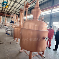 Équipement de distillation d'huile essentielle de cuivre rouge de grande taille 1000L avec réservoir de stockage pour la distillation d'huile essentielle