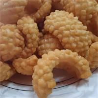 "Collation traditionnelle chinoise: Craquelins croustillants de riz frit avec texture de calmar"