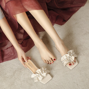 Summer new style <b>sandals</b> for women with one-piece buckle straps, high heels, <b>bow</b> and pearl accents - Product Image 1