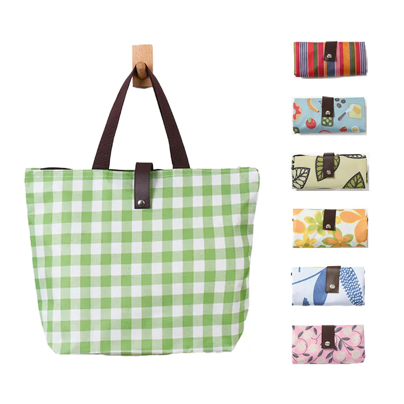 वाटरप्रूफ 600 डी ऑक्सबोर्ड कपड़े विज्ञापन फोल्डिंग शॉपिंग बैग पोर्टेबल पुनः प्रयोज्य रूप से रोल अप बैग