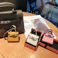 Porte-clés en cuir mini inspiré de H, multifonctionnel, avec rangement pour écouteurs et porte-monnaie, accompagné d'un foulard en soie, accessoire de mode