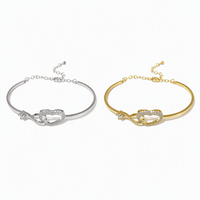 Bracelet tendance en forme de double cœur entrelacé pour femmes, avec pavé de CZ, en cuivre doré, réglable, cadeau de mariage